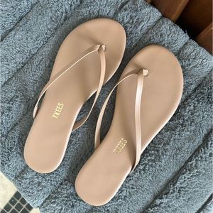 Tkees, brand new. Never worn.